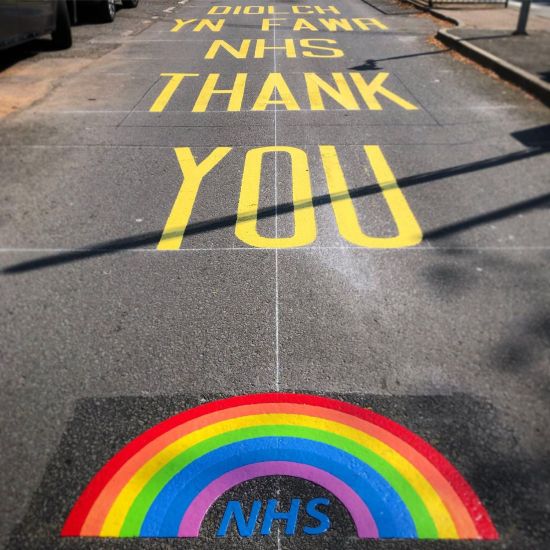 Campaign reports - group of people looking at random data charts